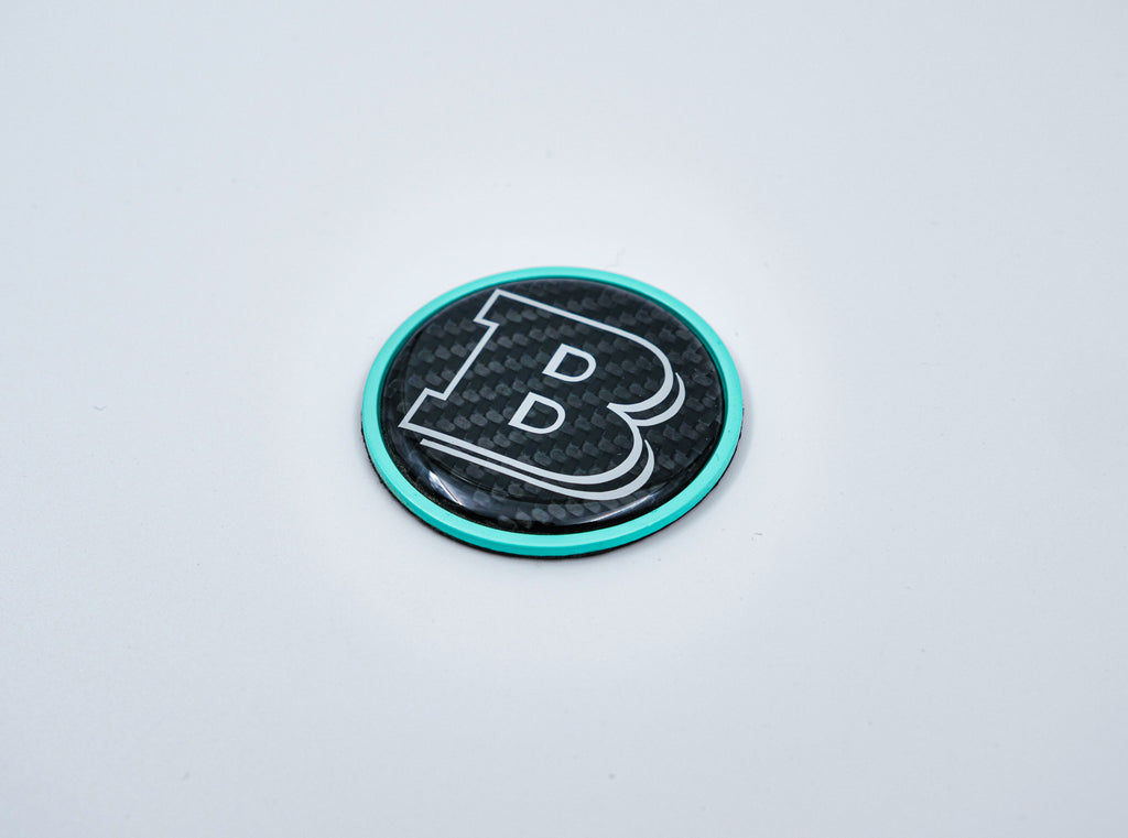 2-Komponenten-Brabus-Logo-Emblem aus kohlenstoffgelbem Metall, 55 mm, für Motorhaubenhutze Mercedes-Benz W463, W463A, W464 G-Klasse