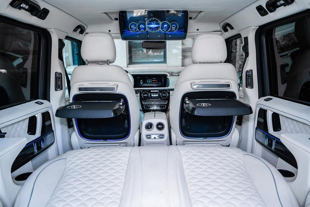 Interior seatback trim with reclining tables, LED lighting and wireless charging for Mercedes G Class W463A