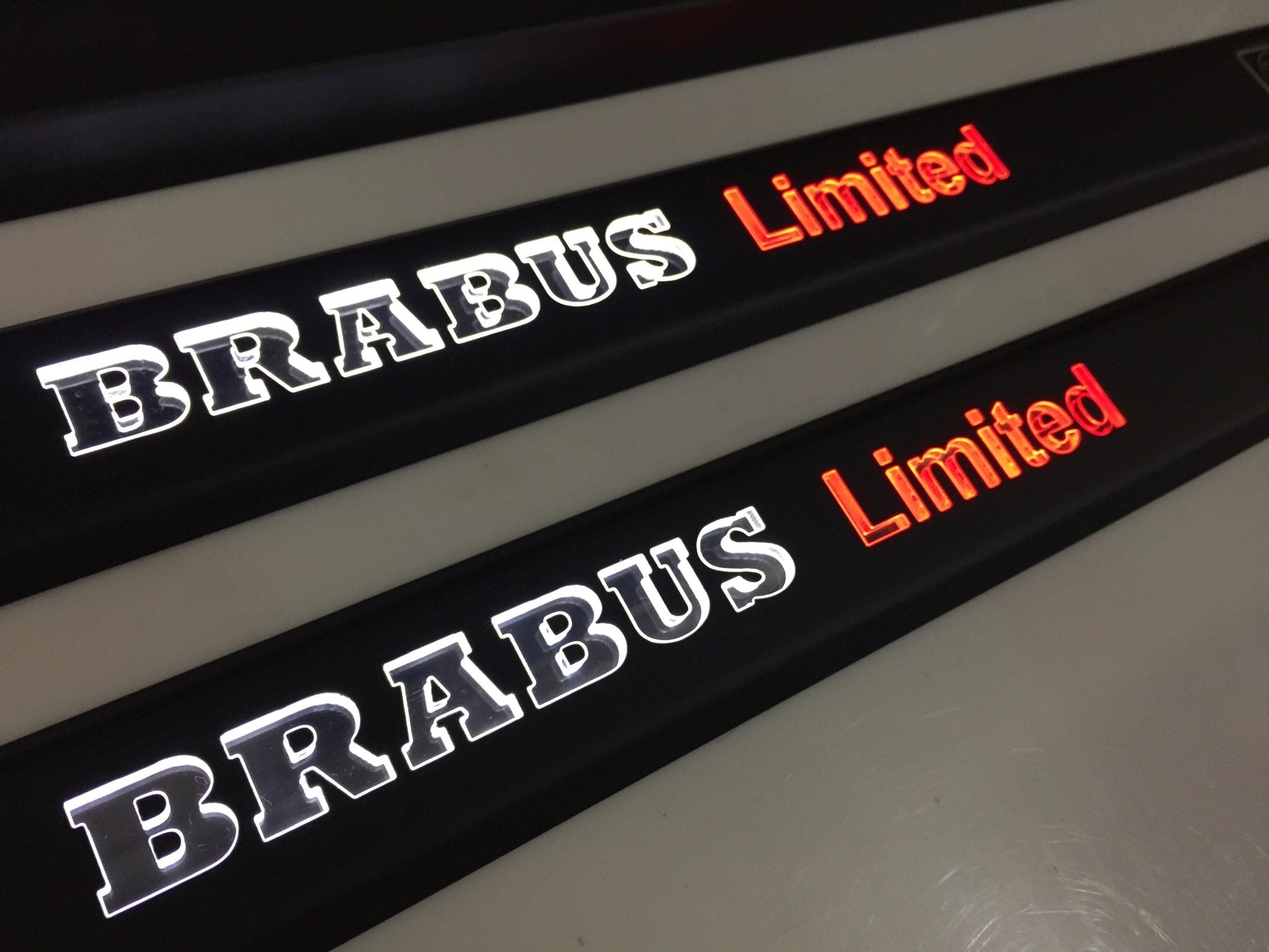 Black door sills Brabus Limited white orange LEDs for Mercedes-Benz G-Class W463