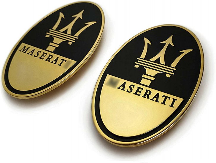 Abzeichen für Maserati-Fußmatten. Goldfarbene Embleme