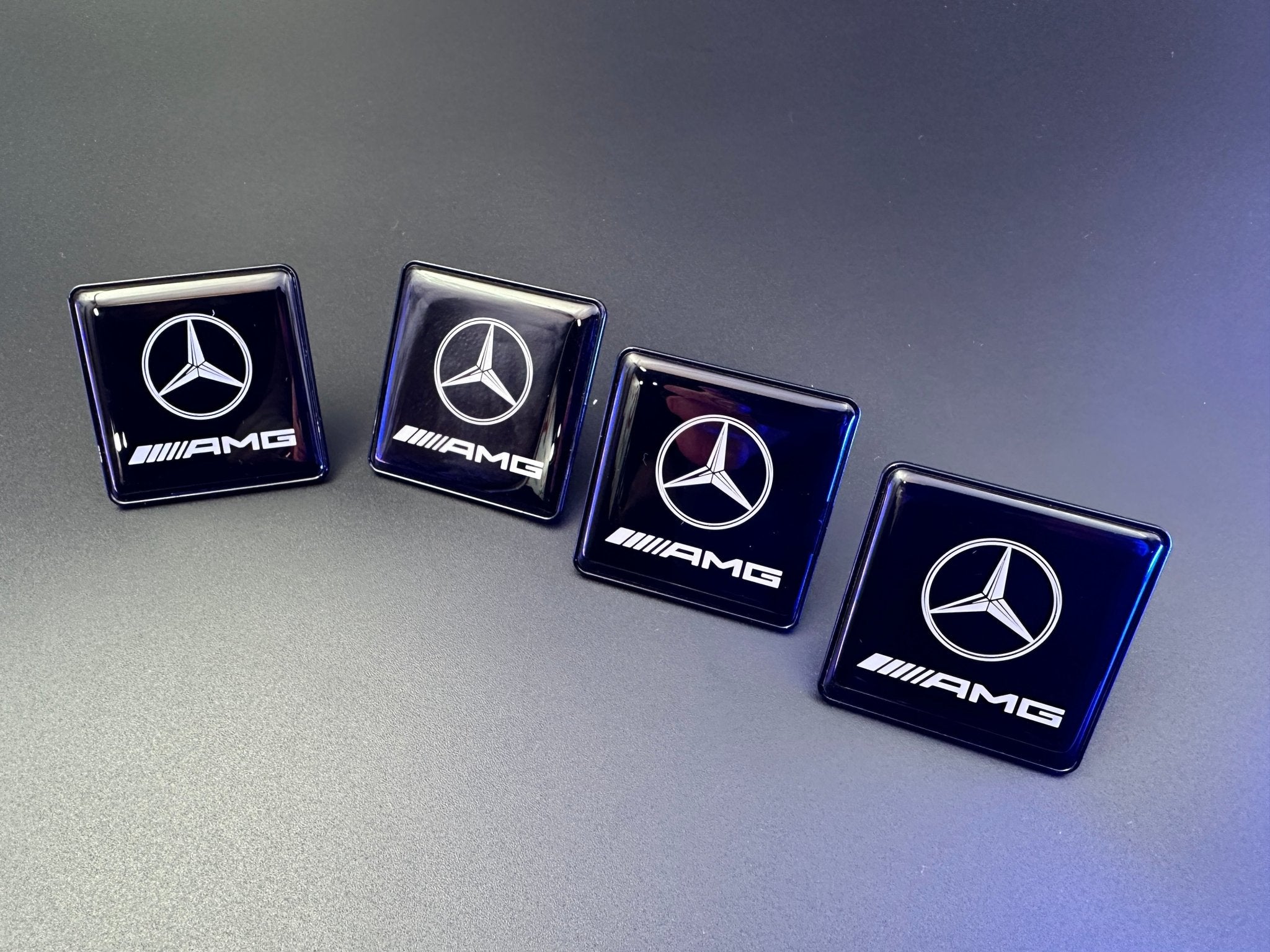 Seats Emblem set in black color with AMG Mercedes-Benz logo