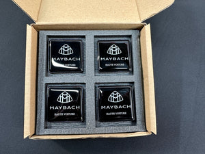 Seats Emblem set in black color with Maybach Haute Voiture logo for Mercedes-Benz