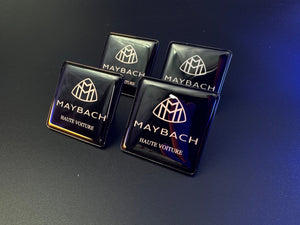 Seats Emblem set in black color with Maybach Haute Voiture logo for Mercedes-Benz
